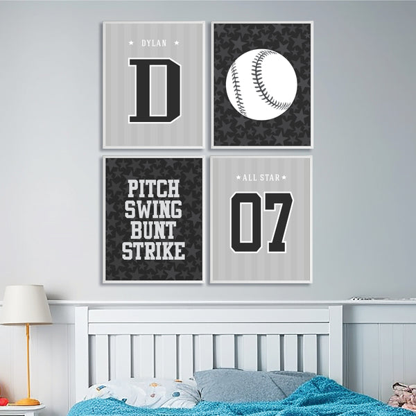 Framed baseball wall art prints displayed on a light blue accent wall in a boys room