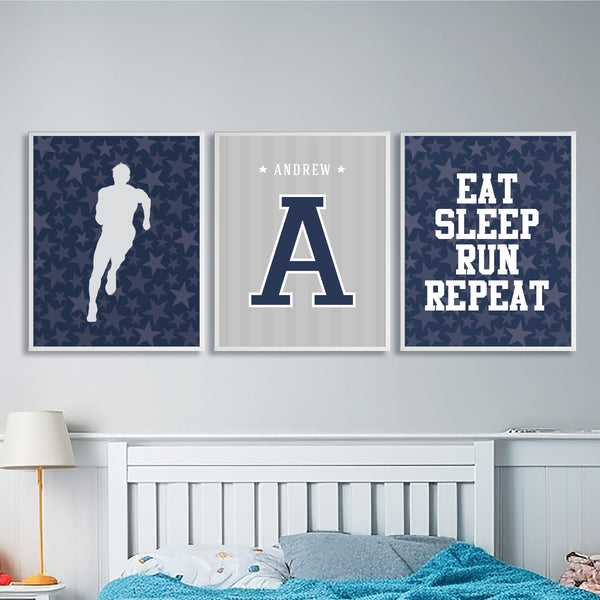 Set of 3 track and field wall art prints framed above a bed in a teen boys sports bedroom