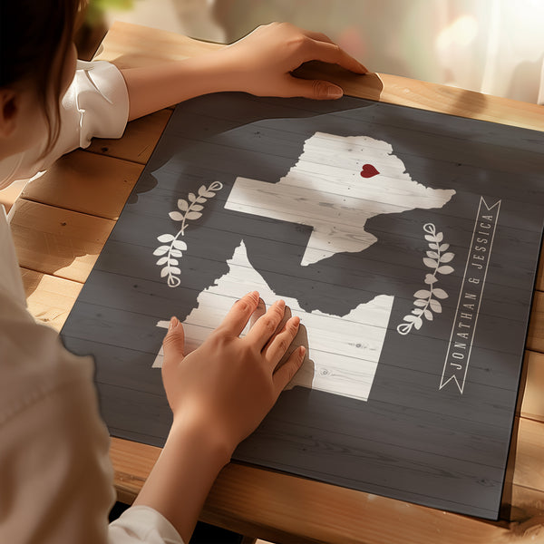 Detail of heart connecting two states on custom love map print for couples