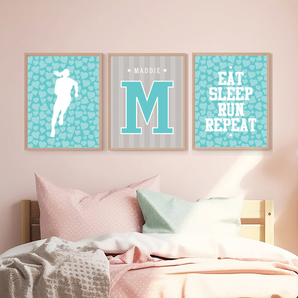 Set of 3 female runner wall art prints framed above a bed in a teen girls bedroom