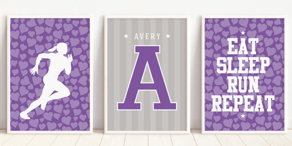 Trio of track and field art prints in purple in modern white picture frames side by side