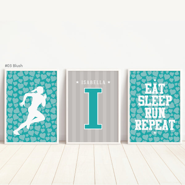 Trio of track and field art prints in modern white picture frames side by side