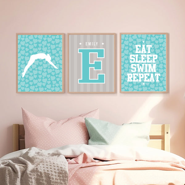 Set of 3 swimmer girl wall art prints framed in a girls bedroom